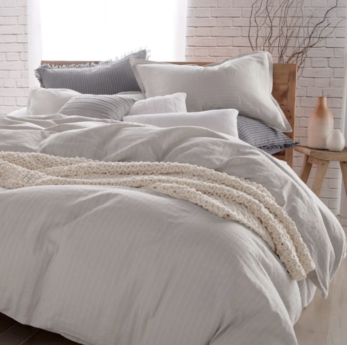 bed with striped bedding
