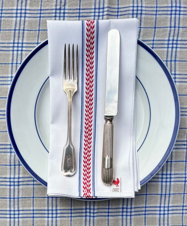 blue red and gray table setting from orient linen co