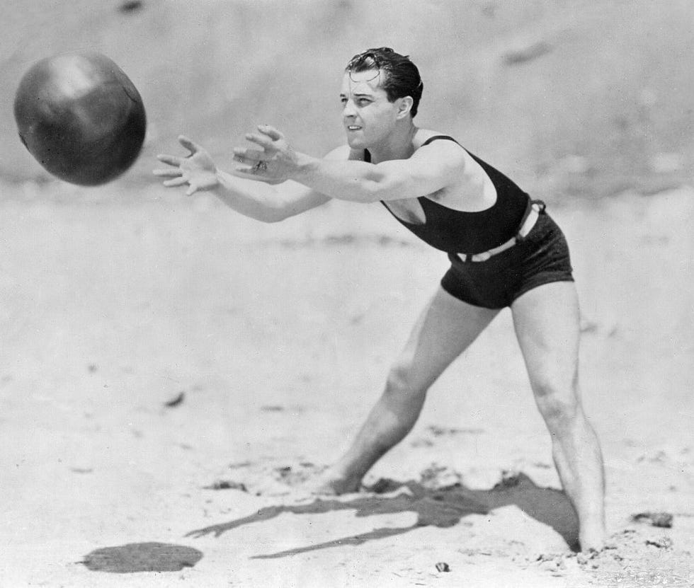 novarro, ramon actor, mexico 06021899 31101968 catching a ball on a beach   published 'dame' 231928   vintage property of ullstein bild