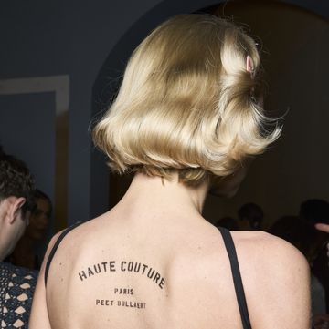 a person with a tattoo on the back