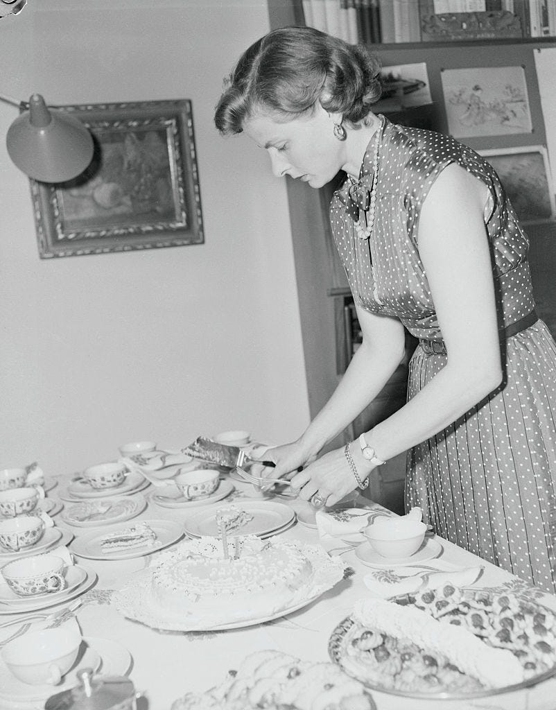ingrid bergman slicing cake