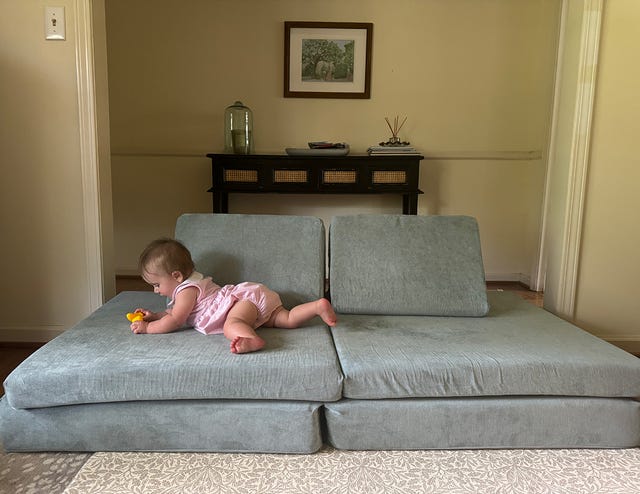 baby on a nugget couch