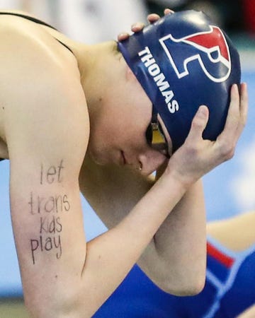 a person with a tattoo on their arm