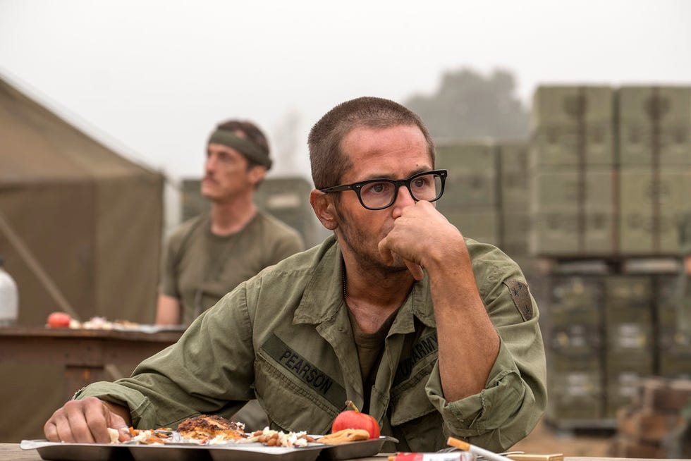 Glasses, Human, Eating, Eyewear, Facial hair, Table, Sitting, Beard, Moustache, 