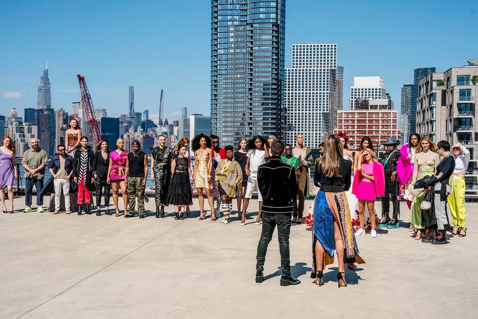 rami kashou, viktor luna, mila hermanovski, bishme cromartie, anna zhou, prajje oscar jean baptiste, korto momolu, laurence basse, fabio costa, nora pagel, kara saun, hester sunshine, and brittany allen stand outside in new york city as they hear from christian siriano and nina garcia during season 20 episode 1 of project runway