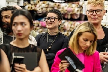 fabio costa, anna zhou, hester sunshine, nora pagel, and johnathan kayne gillaspie standing inside mood fabrics during episode 1 of project runway season 20