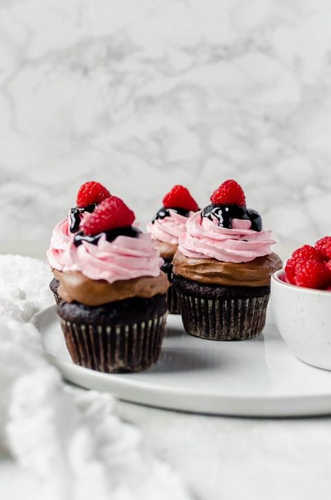 chocolate cupcakes with nutella and raspberry whipped cream frosting