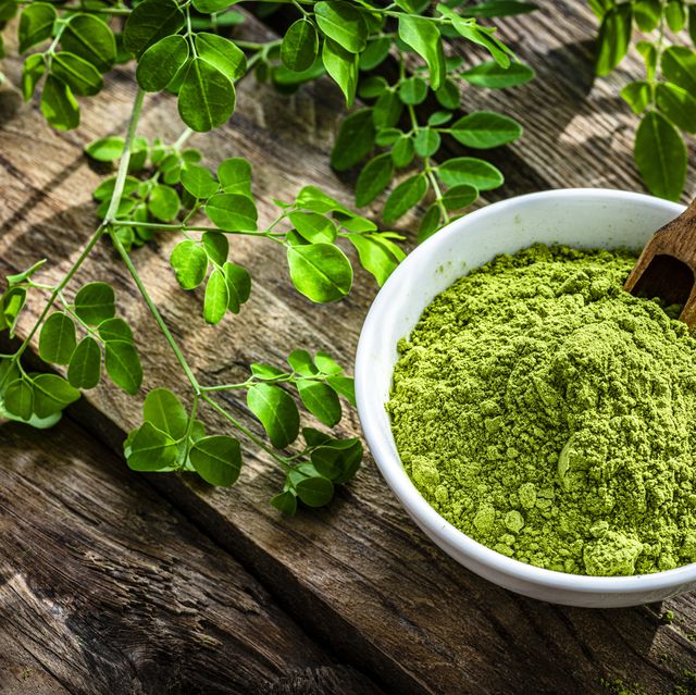 https://hips.hearstapps.com/hmg-prod/images/nutritional-supplement-moringa-powder-on-rustic-royalty-free-image-1659133952.jpg?crop=0.668xw:1.00xh;0.327xw,0&resize=640:*