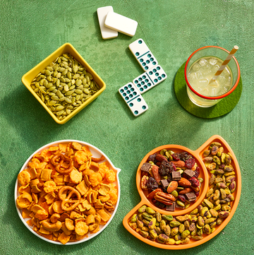 Trail mixes in platters alongside board games trail mixes in platters alongside board games