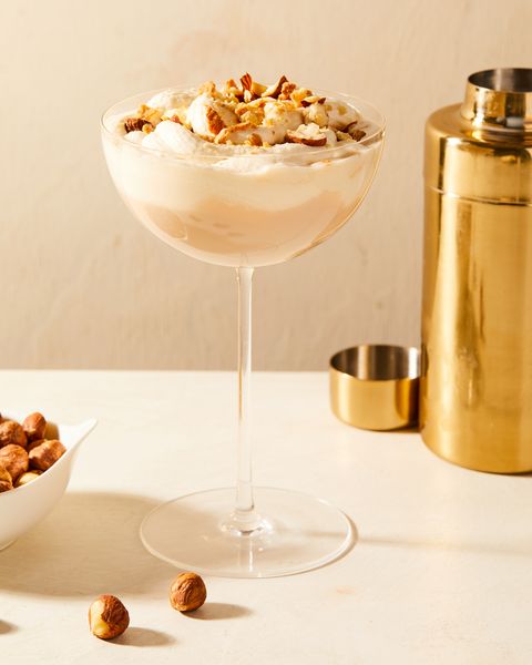 nutty irishman cocktail topped with crushed hazelnuts in a glass