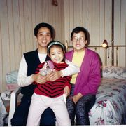 author qian julie wang as a child with her parents