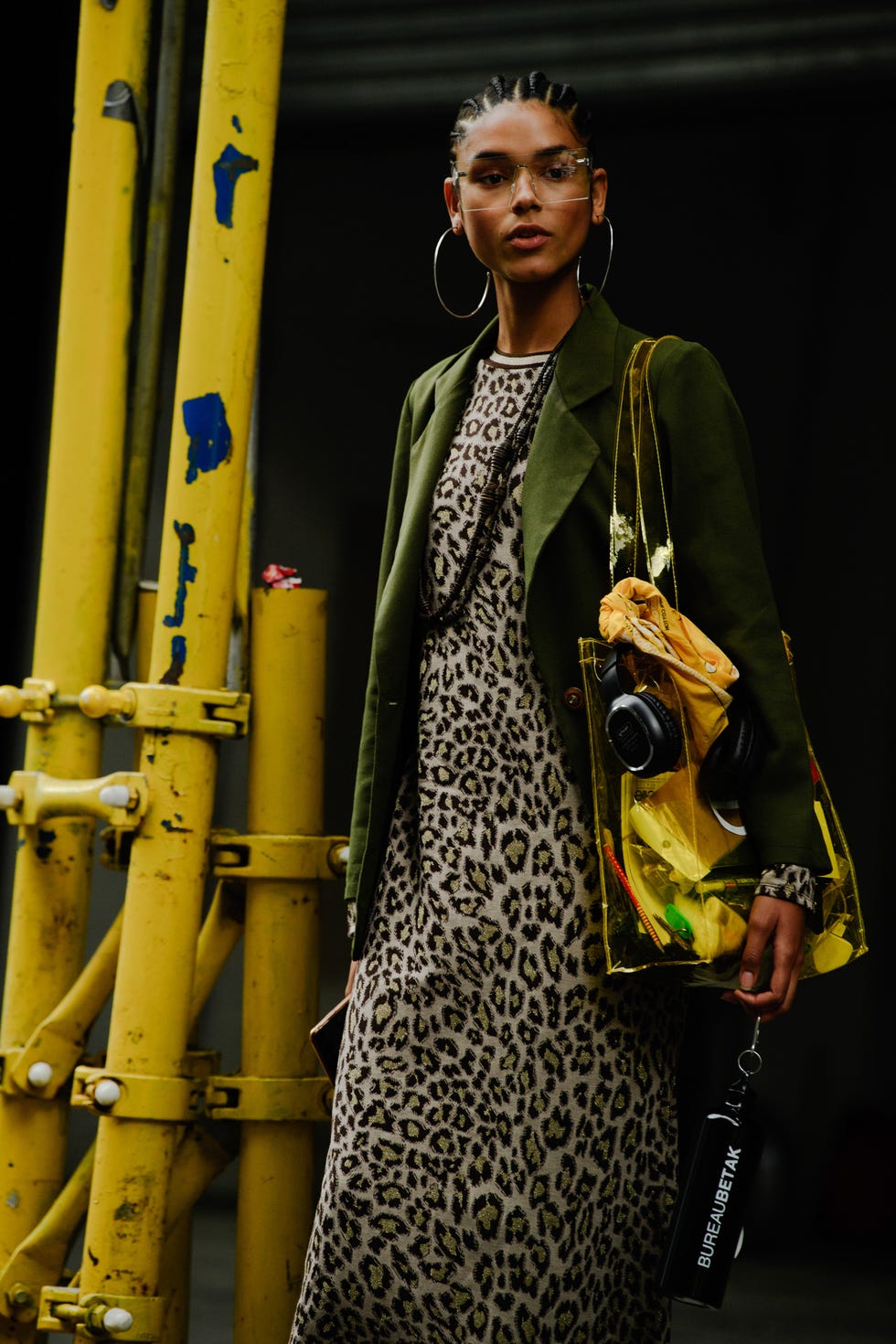 Fashion, Yellow, Fashion model, Street fashion, Fashion design, Fashion show, Formal wear, Model, Outerwear, Performance, 