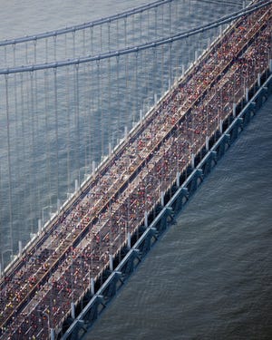 runners cross the verrazzano narrows bridge during the 2023 new york city marathon