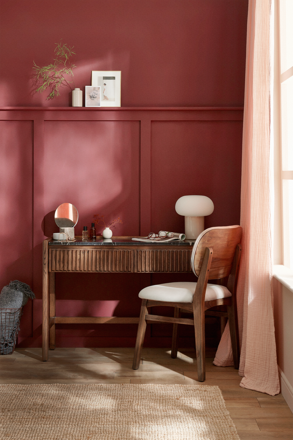 purple burgundy room with chair and lamp