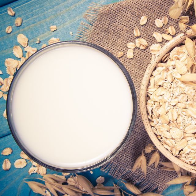 Oat and oat milk. Healthy breakfast, healthy eating concept.
