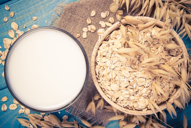 Oat and oat milk. Healthy breakfast, healthy eating concept.