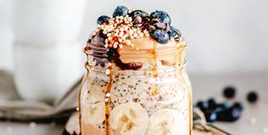 Oatmeal jar with peanut butter, banana and blueberries