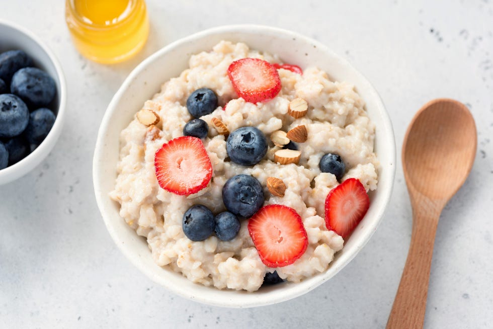 Oatmeal porridge with fresh berries in a bowl