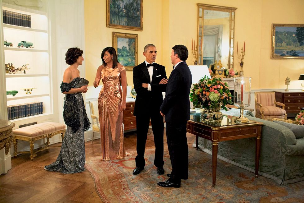 obamas in oval yellow room