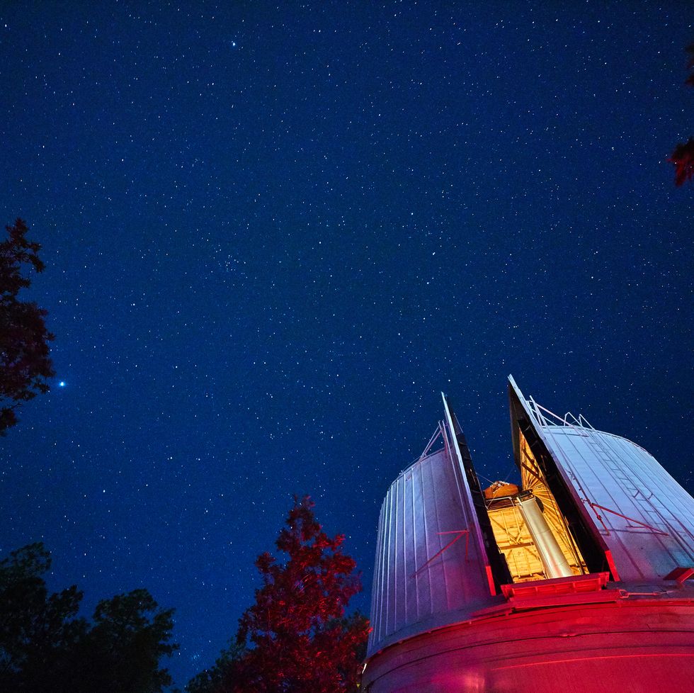 observatory under starry night sky with telescope, sedona