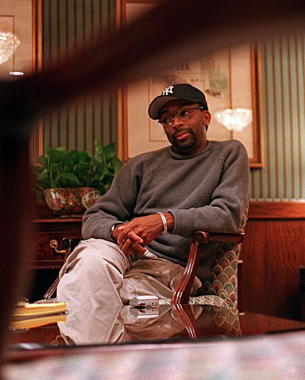 Filmmaker Spike Lee At The Four Seasons boston october 9: filmmaker spike lee is interviewed by a globe reporter at the four seasons hotel. (photo by chitose suzuki/the boston globe via getty images)