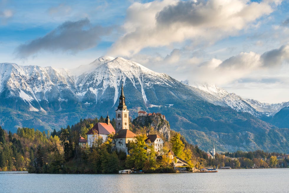 bled island and the pilgrimage church dedicated to the assumption of mary reflecting on the lake bled