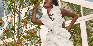 a model wears an akvas wedding dress in a roundup of off the rack wedding dresses 2022