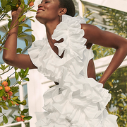 a model wears an akvas wedding dress in a roundup of off the rack wedding dresses 2022