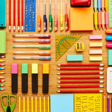 Office and school supplies arranged on wooden table - Knolling office and school supplies arranged on wooden table knolling