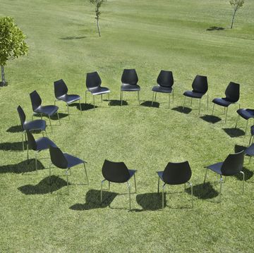 office chairs in a circle in field