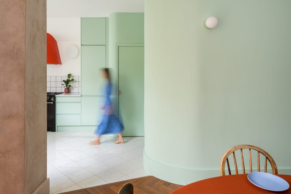 a child walking in a room