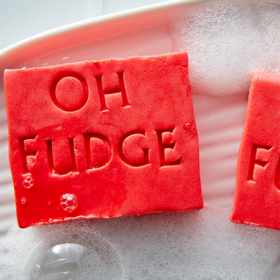 red fudge shaped like soap with the words oh fudge