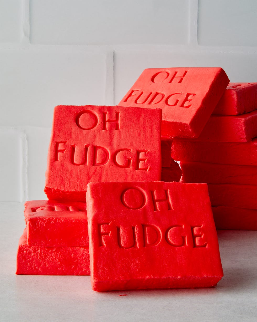 red fudge shaped like soap with the words oh fudge