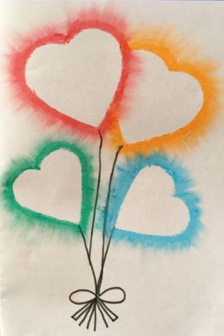 oil pastel valentine's day card idea with heart balloon designs outlined with red, orange, blue and green