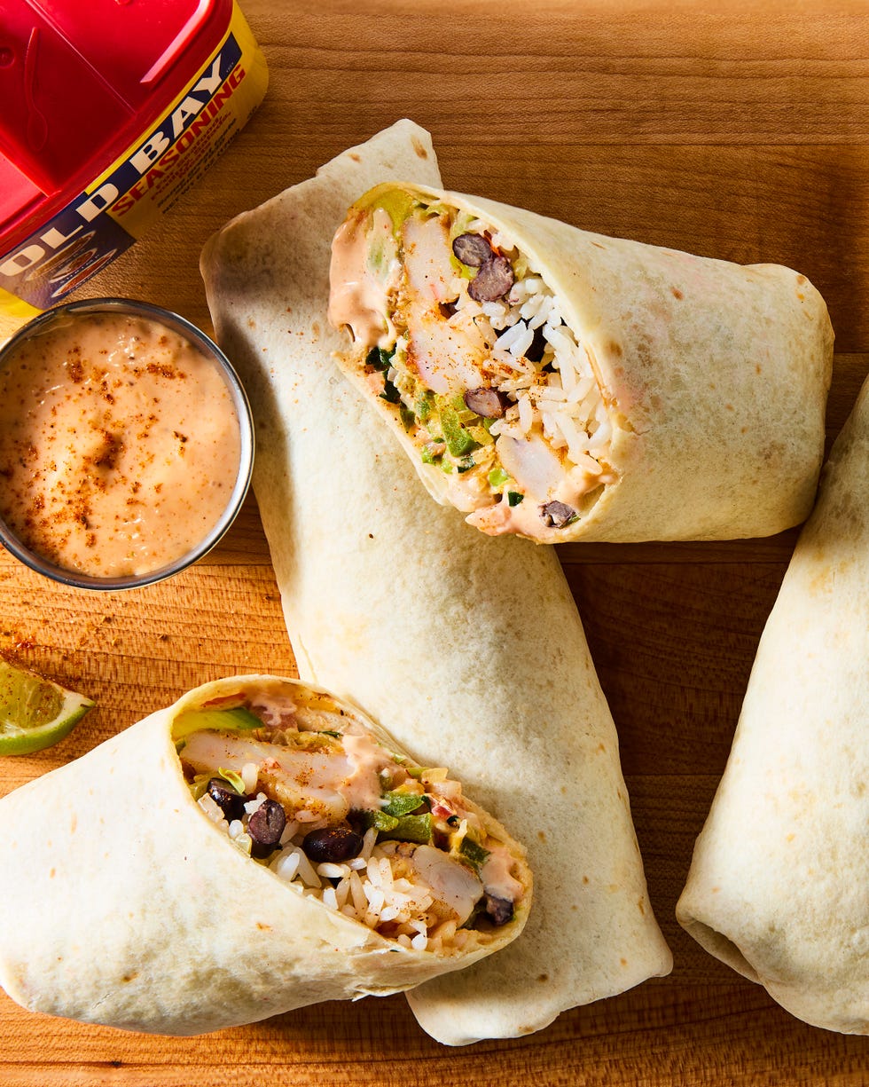 old bay seasoned shrimp in burritos with rice and beans and an old bay aioli