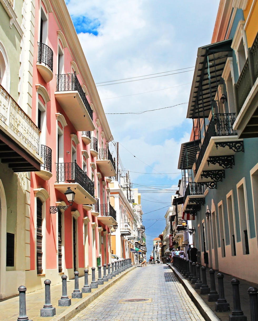 old buildings and blue cobblestones in the streets of old san juan, puerto rico