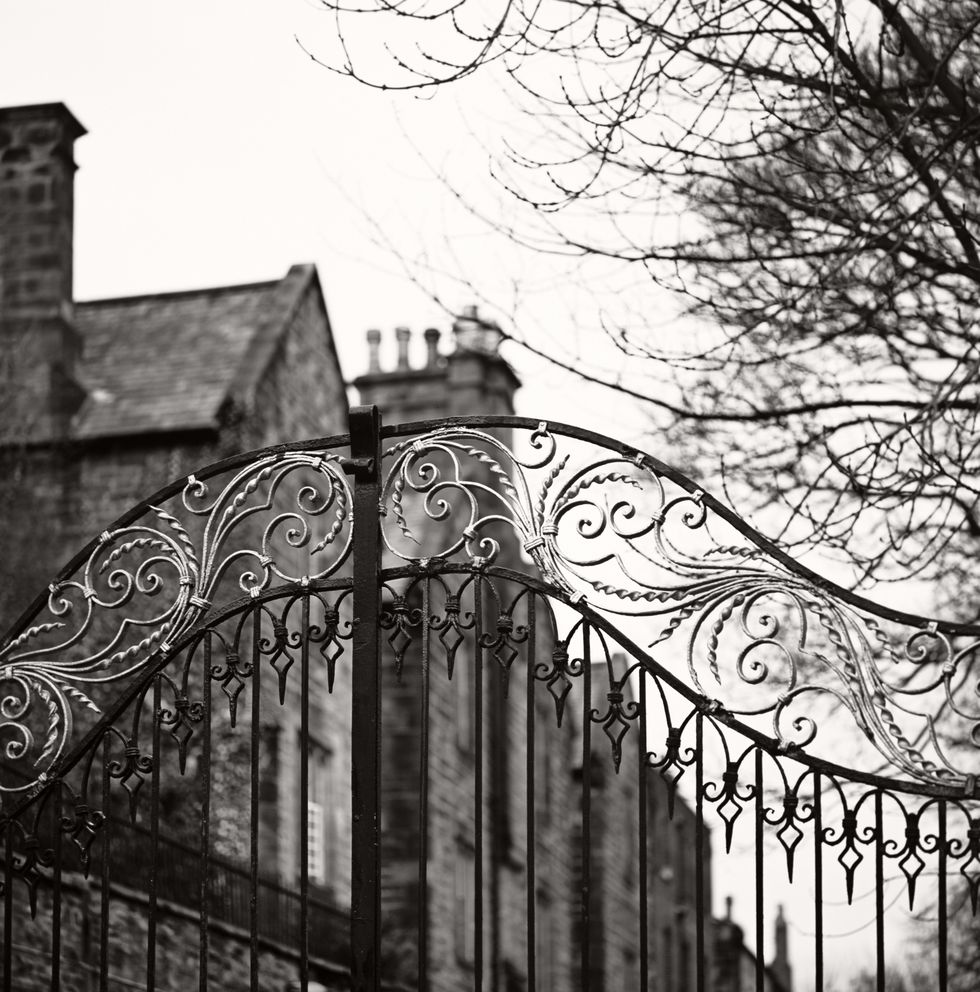 old gate, durham traditional anglosaxon gate, closed, with mansion