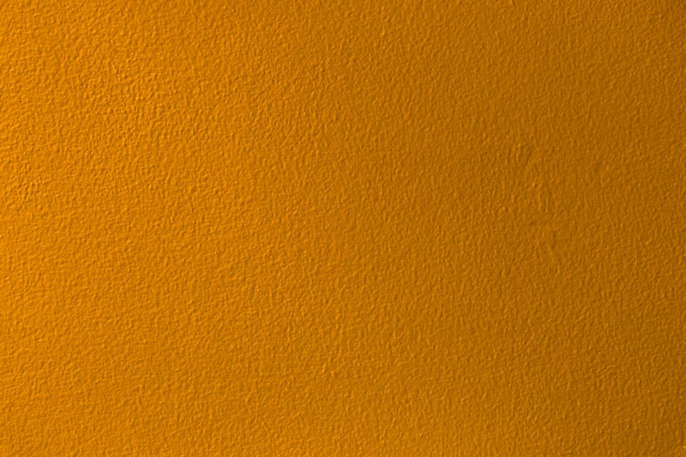 old grunge golden, yellow wall concrete texture as background