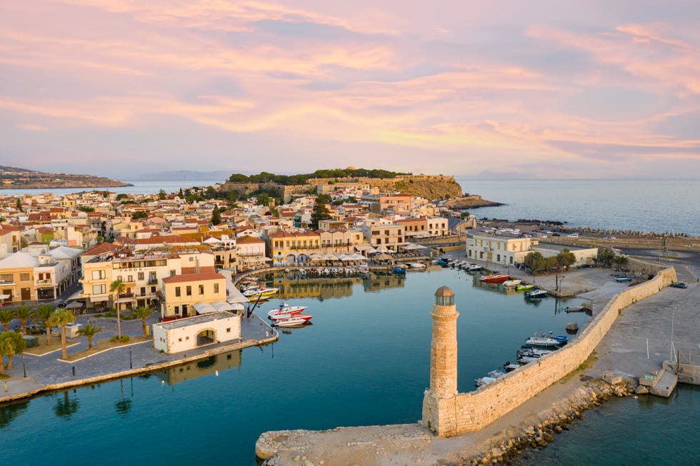 old lighthouse in the venetian harbor, rethymno