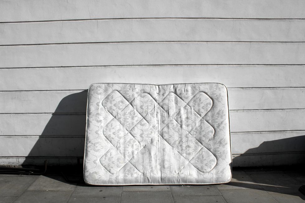 old mattress on street