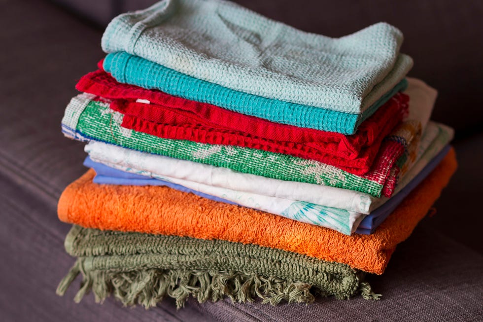 a pile of kitchen rags and towells