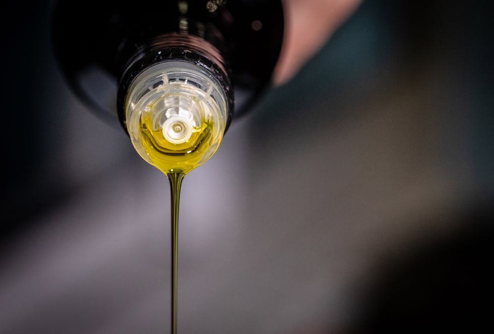 olive oil poured from a bottle