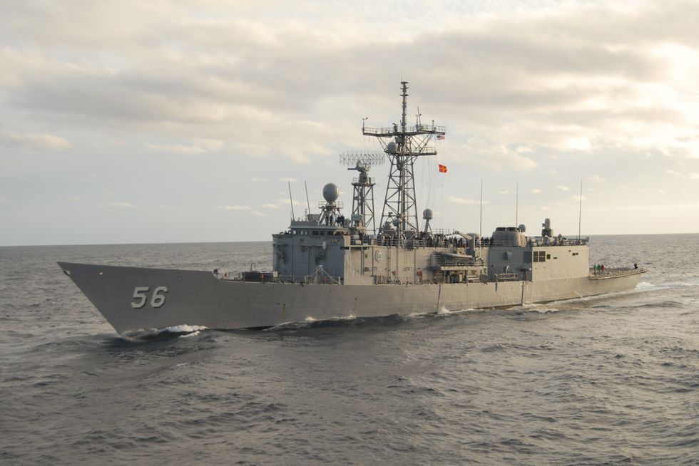 070403 n n 2735t 205 uss simpson ffg 56 pulls up alongside uss bainbridge ddg 96 during maneuvering exercises in the atlantic ocean the simpson and the bainbridge are both in transit to participate in the neptune warrior training course, which will test the interoperability of nato coalition forces us navy photo by mass communication specialist seaman coleman thompson
