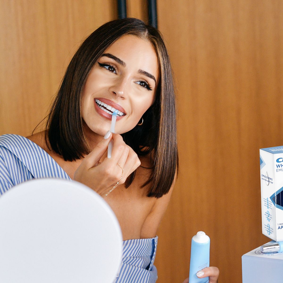 https://hips.hearstapps.com/hmg-prod/images/olivia-culpo-applies-new-crest-whitening-emulsions-leave-on-news-photo-1682710920.jpg?crop=0.748xw:0.907xh;0.00801xw,0.0932xh&resize=1200:*