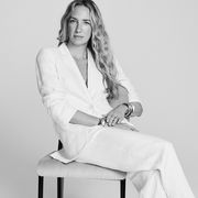 olympia gayot wears a white suit to illustrate her lucky 13 shopping guide for bazaar