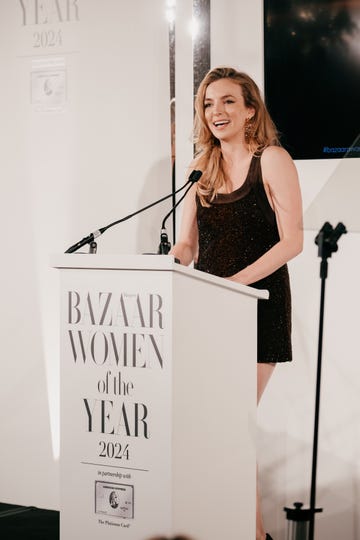 speaker at a podium during an awards event