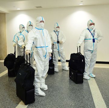 topshot   flight crew from air china arrive in hazmat suits in the international terminal at los angeles international airport on december 3, 2021, as los angeles county reported its first case of the new covid 19 variant, omicron photo by frederic j brown  afp photo by frederic j brownafp via getty images