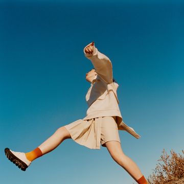 a woman jumping in the air