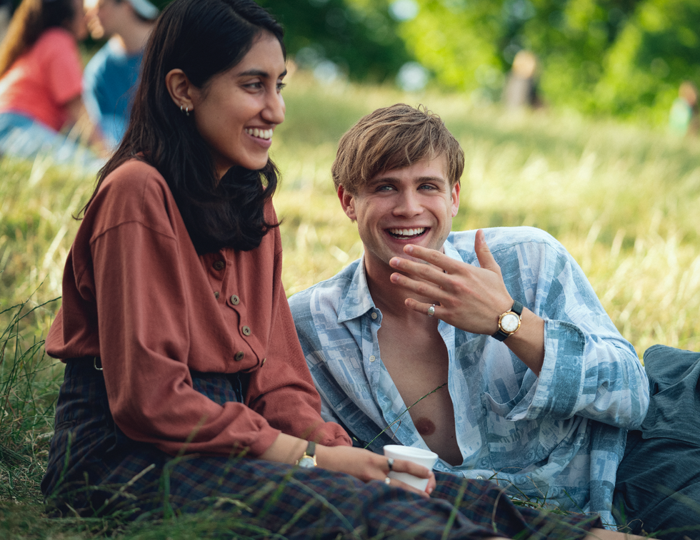 A Man and a Woman Sitting on the Grass One Day Netflix