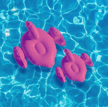 large and small flamingo pool float in water large and small flamingo pool float in water